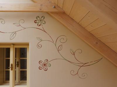 ...zároveň je však ozvláštněna abstraktním podbarvením (barevné úseky jsou naneseny nezávisle na umístění květů, listů apod.)